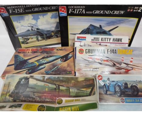 Airfix, Revell, AMT, Monogram - A group of 7 boxed civilain and military plastic model kits in a variety of scales. Lot inclu