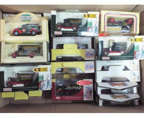 Lledo, Vanguards - In excess of  50 boxed diecast model Eddie Stobart vehicles and haulage trucks. Lot includes, Cargo Kings 