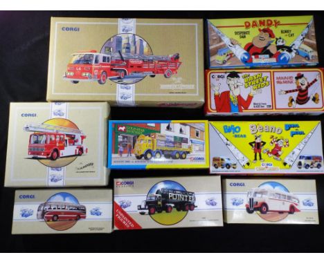 Corgi - Nine boxed diecast model vehicles by Corgi. Lot includes 97321 American LaFrance Aerial Ladder Truck, 09802 ERF 8 Whe