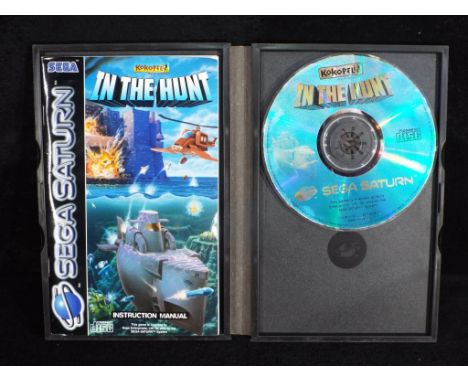 Sega Saturn - A Sega Saturn 'In the Hunt' video game, in its original box complete with its instruction manual.