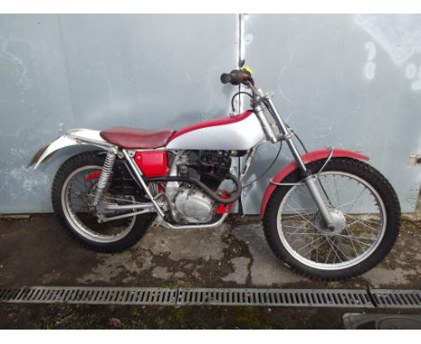 A 1978 Honda TL125, registration number AVG 520S, silver and red.  Introduced in 1972, the TL125 was the start of an illustri