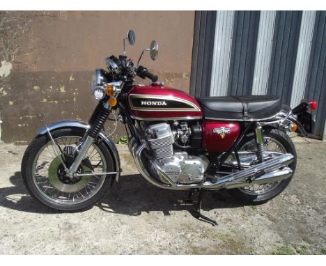 A 1977 Honda CB 750/Four, registration number SRU 695R, chassis CB750-2576908, engine number CB750E-2466710, red. Honda's CB7