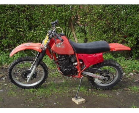 A 1985 Honda XL250R, unregistered, red. Finished in traditional Honda red, this XL250R has been used as a scrambler. It featu