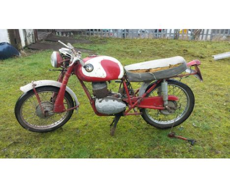 A 1961 Norman 4 Sports, red and white. The sporting, Italian inspired, lightweight 4 Sports was one of Norman's last models p