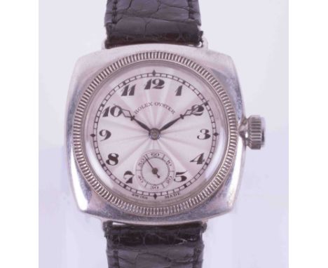 Rolex, a early gents Oyster manual wind cushion wristwatch, dial has some restoration, on leather strap. Its possible that th