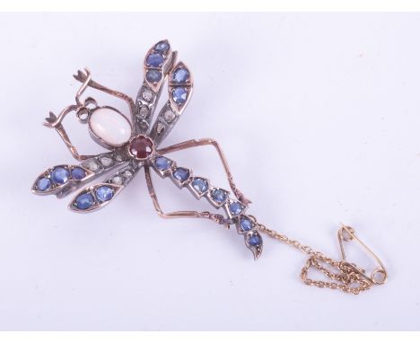 A rose &amp; white gold (not hallmarked or tested) dragonfly brooch with a yellow gold safety chain, set with on oval cabocho