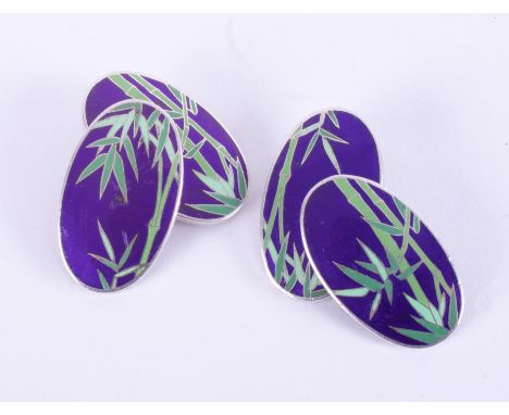 A pair of oval silver &amp; enamel cufflinks with a bamboo design, approx. 1.9cm length x 1cm width, 10.88gm.