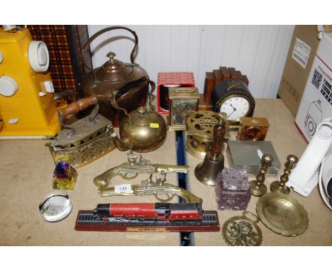 A quantity of various metalware and other ornaments to include a copper kettle, a brass iron, two decorative brass pistols, a
