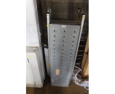 A four fold metal combination ladder; a ladder stabilizer bar and two walk boards