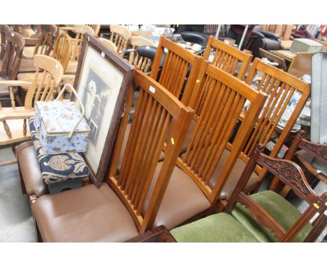 A set of six high back stick back oak dining room chairs