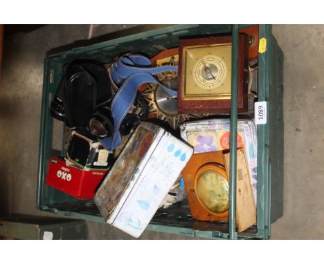 A tray containing various tins, clocks, barometer, cameras, lenses 