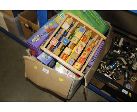 A box containing various toys, games, children's abacus, chemistry set etc.