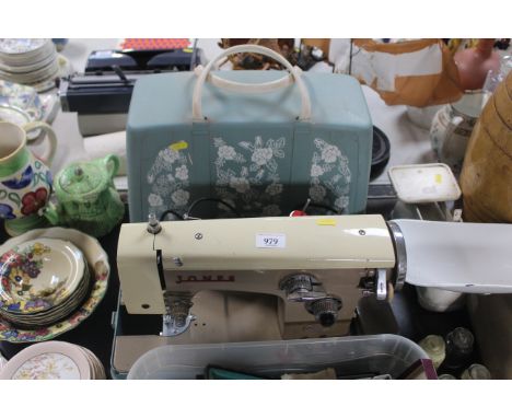 A Jones 110 electric sewing machine with case, sold as a collectors item
