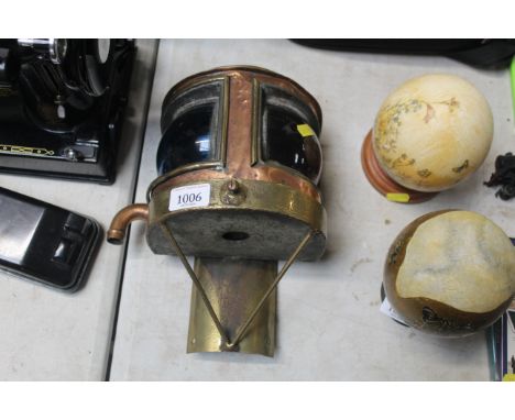 A copper and brass ship mast head light