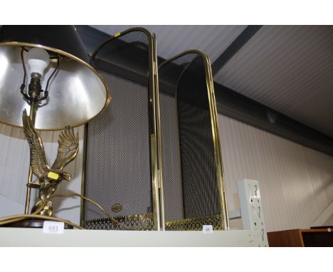 A four fold metal fire screen