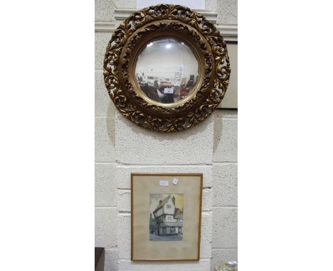A circular gilt frame convex mirror, 54cm diameter overall, K S Wood, 'Public House with figures outside', a signed watercolo