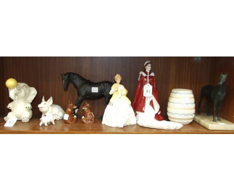 A Royal Worcester figure 'Queen Elizabeth II 80th Birthday 2006', 23cm high, another, 'First Dance', a Crown Devon comical el