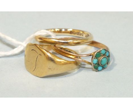 A 9ct gold wedding band, size K½, a 9ct gold signet ring, size H and a small ring set turquoise cluster, size M½, total weigh