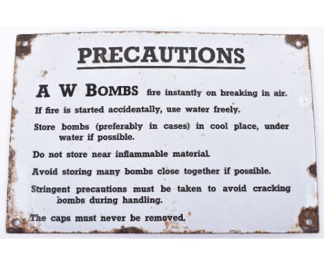 WW2 Enamel Sign “PRECAUTIONS” A W Bombs, rectangular white enamel sign with details of how to store the bombs. Some rusting b