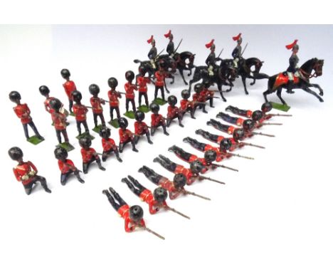 Britains set 90, Coldstream Guards firing THIRD VERSION, gaitered, with incorrect marching Officer and Trumpeter, ten with in