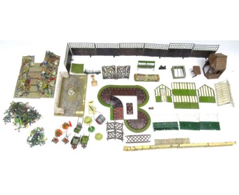 Britains Miniature Gardening forty-two flowers (some recast), seven trellis, eleven flower beds, three mowers, cold frame, tw