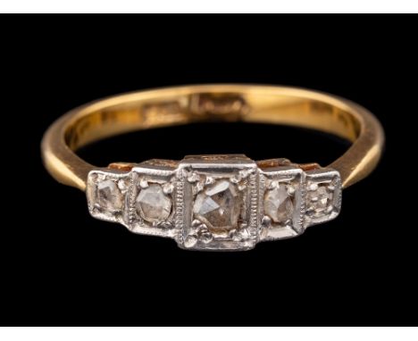 A diamond ring,: set with five rose cut diamonds, stamped 18ct Plat, ring size Q.