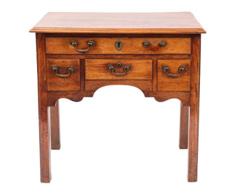 A George III mahogany rectangular lowboy:, the top with a moulded edge, fitted with a single long and three short drawers in 
