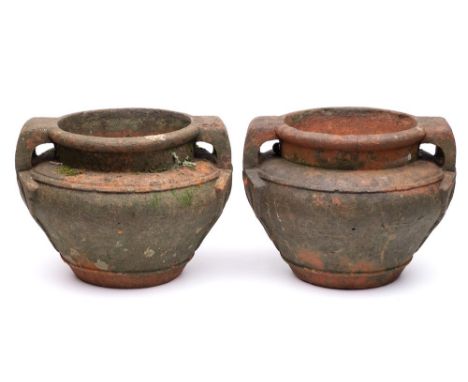A pair of Compton Pottery-style terracotta two-handled garden urns: of Celtic design in the manner of Archibald Knox, 37cm wi