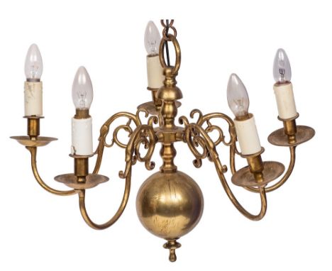 A brass five-branch chandelier:, in the 17th Century Dutch style, with scrolling branches and a central turned column with ri