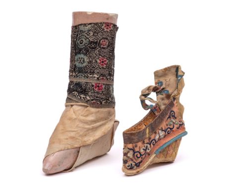 A Chinese bound foot mannequin: 17cm long, together with one silk shoe (2).