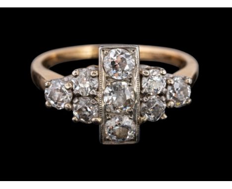 A diamond cluster ring,: the cluster set with old brilliant cut diamonds, approximately 1.10 carats total, ring size N.