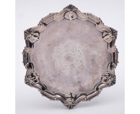 An Edward VII  silver waiter, maker William Hutton &amp; Sons Ltd, London, 1904: with moulded scroll and shell patterned bord