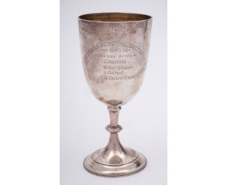 An Edward VII silver trophy cup, maker William Hutton &amp; Sons Ltd, Sheffield, 1903: inscribed, with ovoid bowl on a knoppe