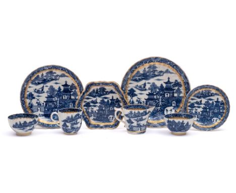 A group of Caughley blue and white porcelain: with fluted rims, transfer printed in the 'Temple' pattern with gilt borders, s
