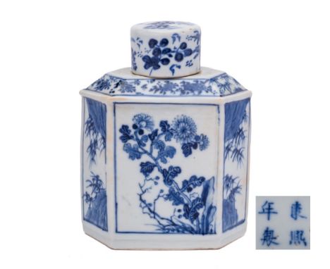 A Chinese blue and white lozenge section tea canister and cover: painted with bamboo and flowering shrubs, apocryphal four-ch