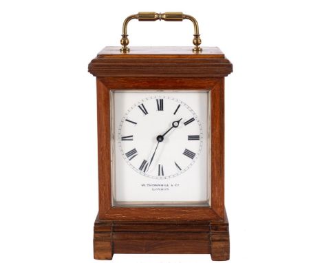 A French Victorian walnut cased carriage clock retailed by Thornhill, London: the eight-day duration timepiece movement havin