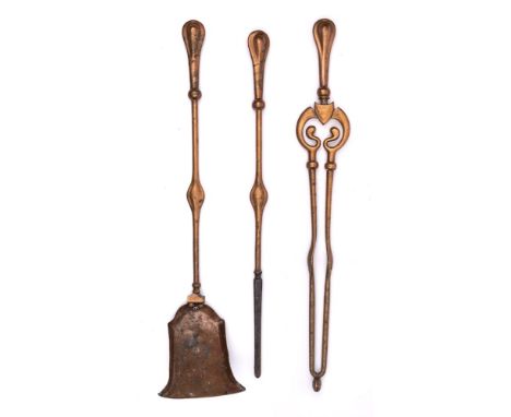 A set of Art Nouveau influence brass fire tools: includes poker, tongs and shovel. (3).