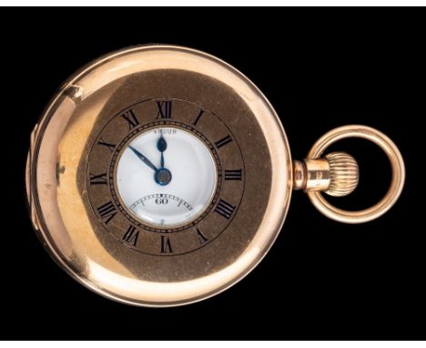 A 9 carat gold half hunter pocket watch,: the white enamel dial with black Roman numerals, blue steel hands and a subsidiary 