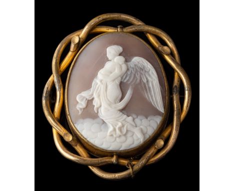 A shell cameo brooch,: the oval shell cameo carved with Nyx, collet set with an openwork surround, 6.5cm long.