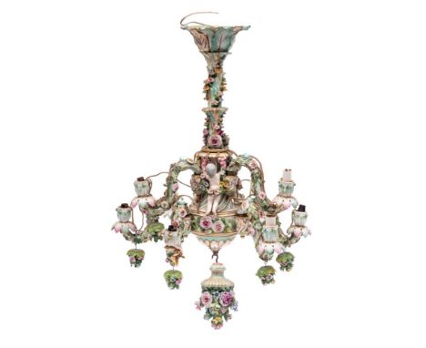 A German porcelain six-branch chandelier in the Meissen manner: applied and moulded with cherubs, flowers, acanthus  and othe