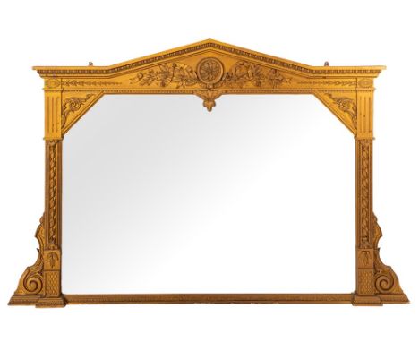 An Edwardian later gilt wood and gesso architectural overmantel:, having a pointed arch and egg and dart cornice, foliate, ri