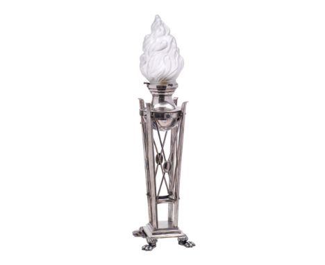 An early 20th Century plated table lamp: the circular reservoir with opaque glass flame shade, supported on four square colum