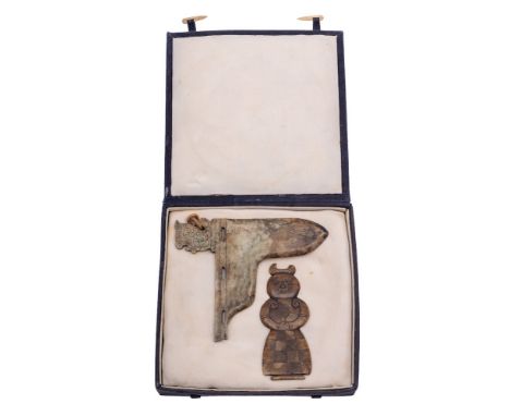 An oriental jade ornamental axe head: of T-shaped outline16cm wide together with a jade figure (damaged) (2)