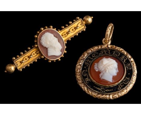 A mid Victorian shell cameo brooch,: circa 1870, the oval shell cameo carved with the profile of a bearded gentleman, on an E