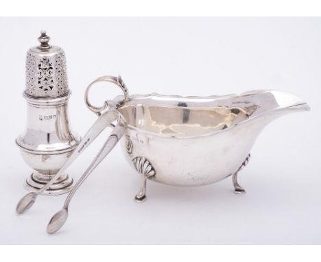 A mixed collection of silver: various makers and dates includes Victorian soup ladle, a sauce boat, pepperette , meat skewer 