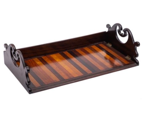 A Victorian rosewood and specimen wood book trough: of rectangular outline with folding arched ends having pierced loop carry