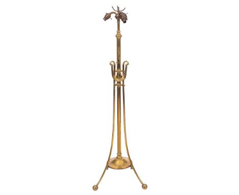 An Aesthetic movement brass standard lamp:, with adjustable column and triple cluster column surround, headed with drapery, h