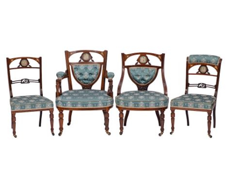 An Edwardian rosewood, inlaid and ceramic mounted four piece salon suite:, bordered with boxwood lines, decorated with foliat