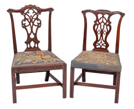 A George III carved mahogany dining chair: the back with shaped arched top rail with gadrooned and foliate ornament, central 