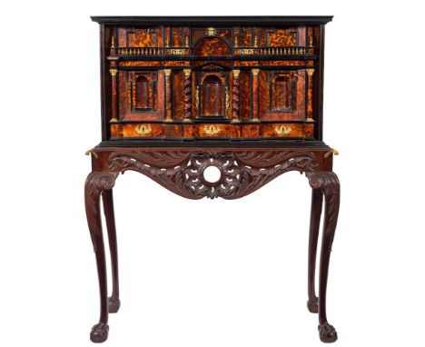 An early 18th Century Italian tortoiseshell, ebony and coromandel wood architectural cabinet on a 19th Century carved mahogan